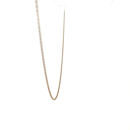 9ct yellow gold chain weighing 1.3g, showcasing a delicate and elegant jewelry design with a secure clasp.