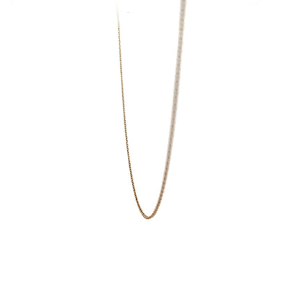 9ct yellow gold chain weighing 1.3g, unbranded jewelry with a classic link design, shown in a detailed product image