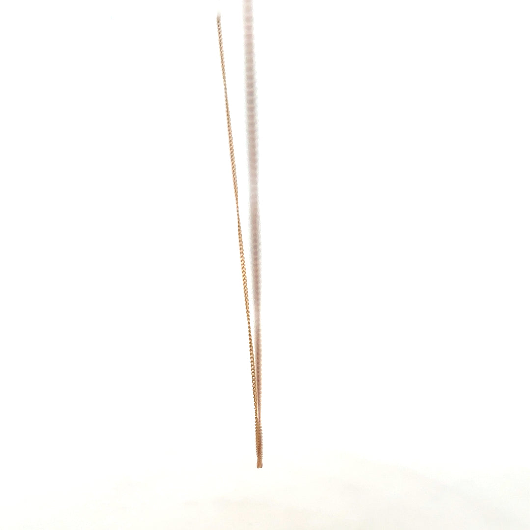 9ct yellow gold chain weighing 1.4g, unbranded, with a classic link design, displayed against a neutral background.