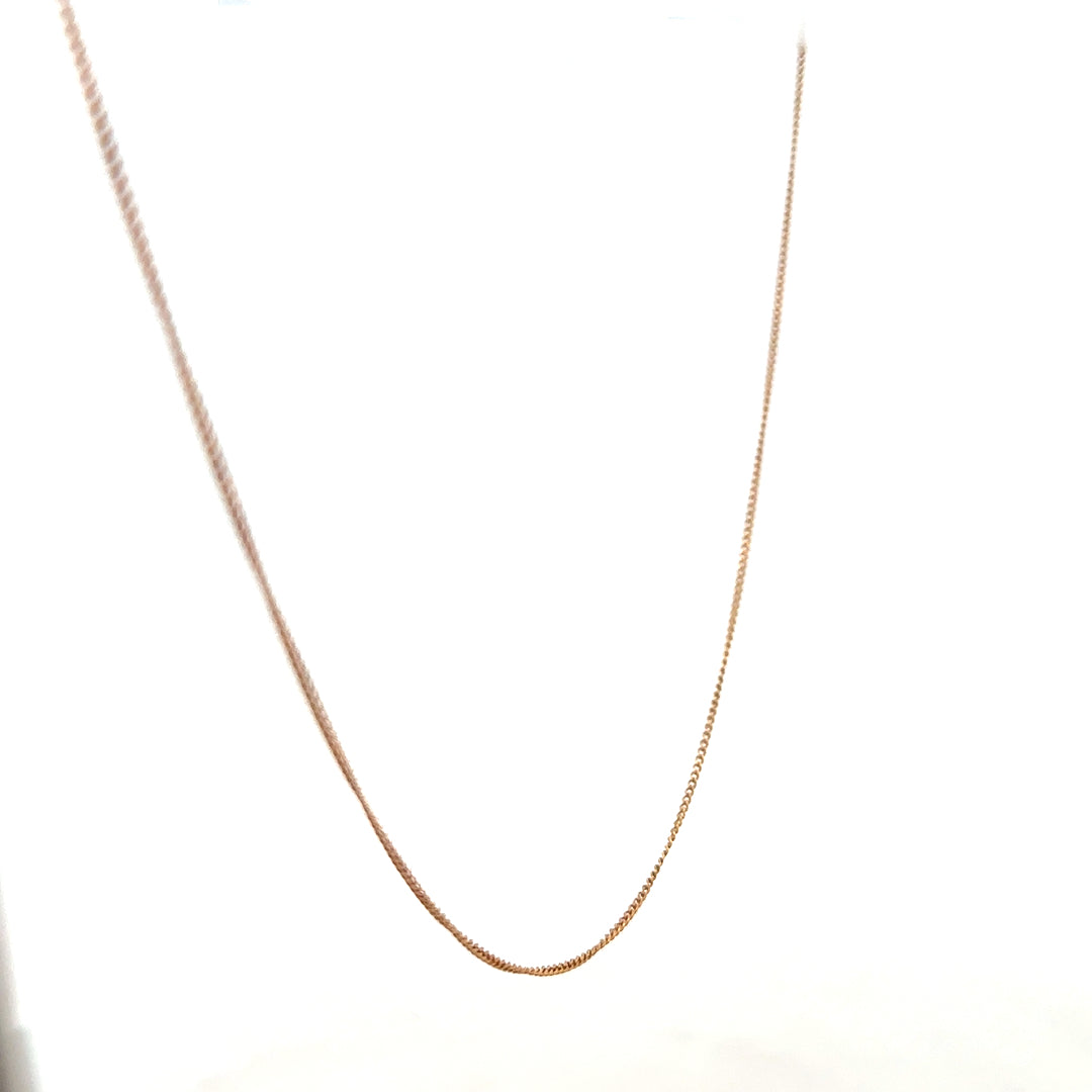 9ct yellow gold chain weighing 1.4g, unbranded, with a classic link design, shown in a close-up image.