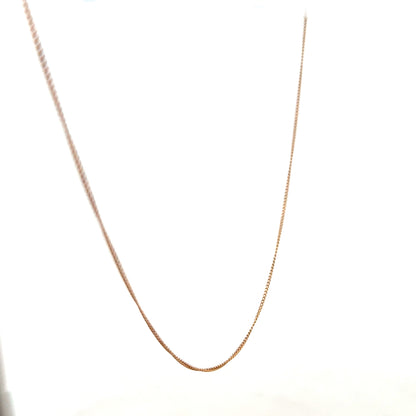 9ct yellow gold chain weighing 1.4g, unbranded, with a classic link design, shown in a close-up image.