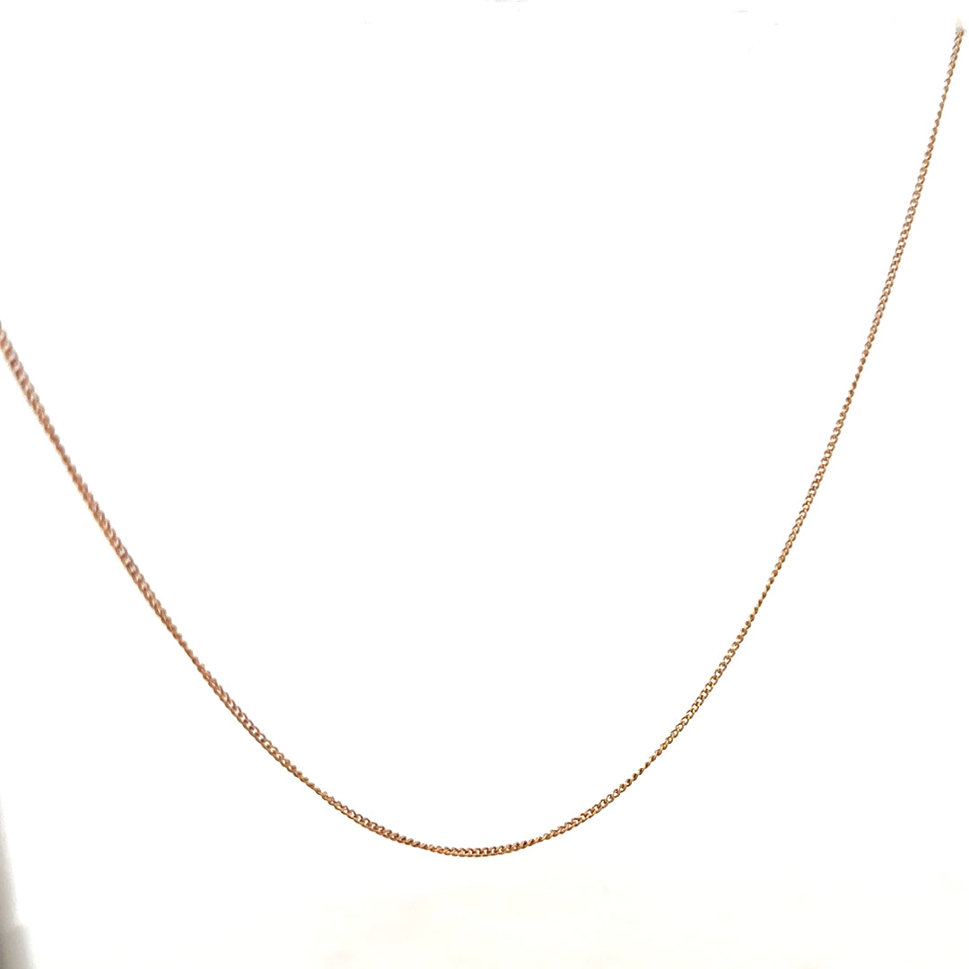 9ct yellow gold chain, 1.4g, unbranded, with a classic link design, shown in close-up on a white background.