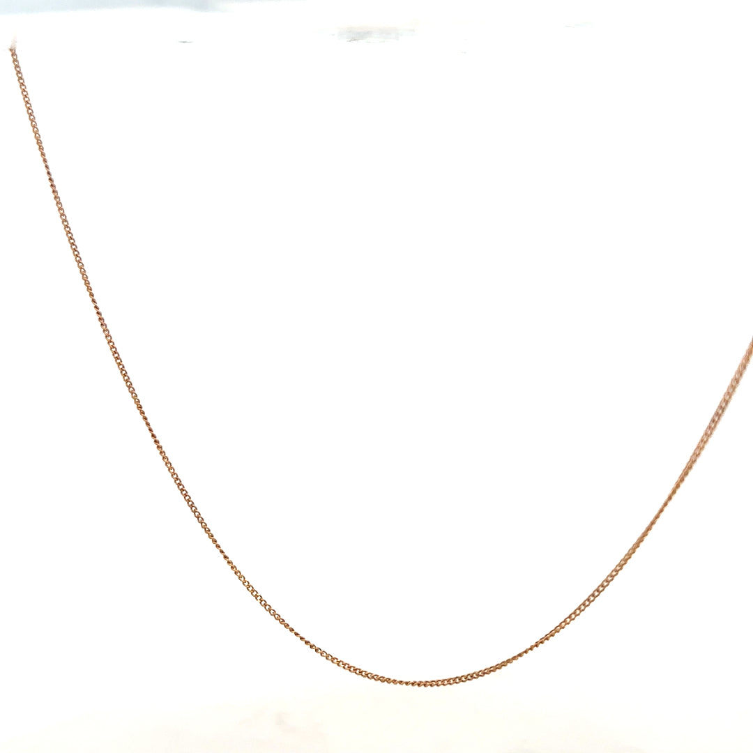 9ct yellow gold chain weighing 1.4g, featuring a classic link design, unbranded jewelry accessory.