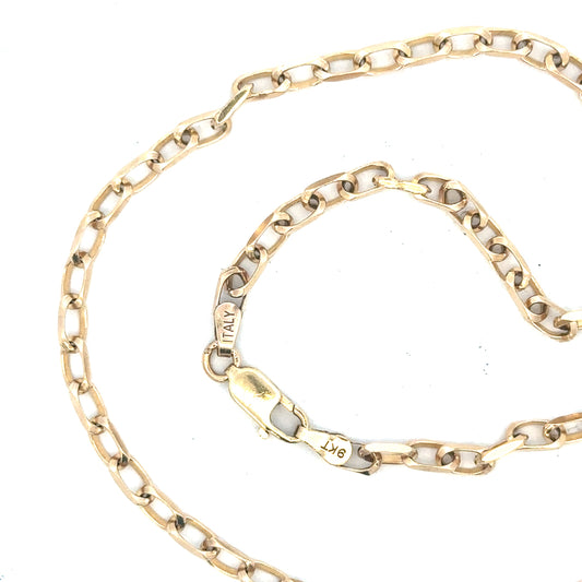 9ct yellow gold chain weighing 10.9g, featuring a classic link design, unbranded jewelry image with detailed craftsmanship.
