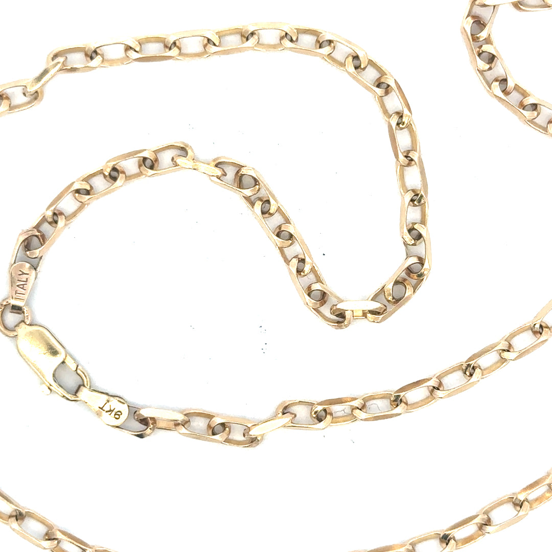 9ct yellow gold chain weighing 10.9g, unbranded, with a classic link design, shown lying flat on a white background.