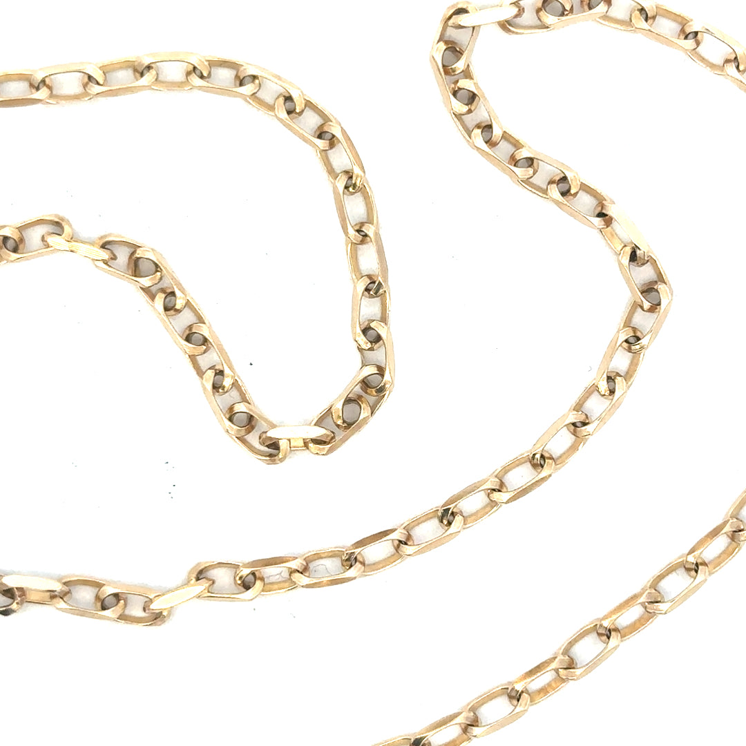 9ct yellow gold chain weighing 10.9g, featuring a classic link design, unbranded jewelry piece with polished finish.