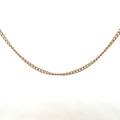 9ct yellow gold chain weighing 10.9g, unbranded, with a detailed close-up of the chain's links and shine.