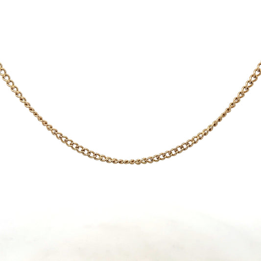 9ct yellow gold chain weighing 10.9g, unbranded, with a detailed close-up of the chain's links and shine.