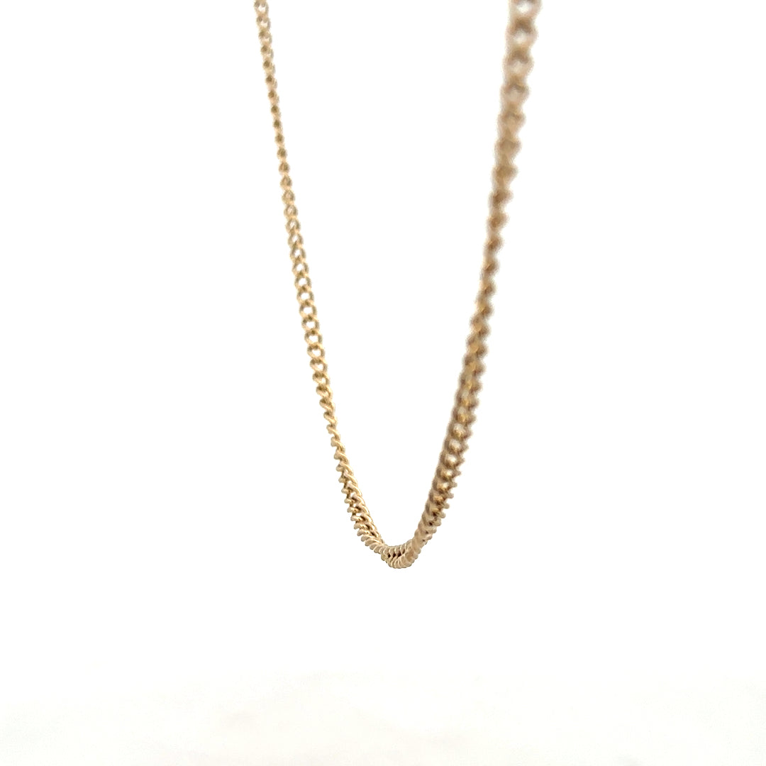 9ct yellow gold chain weighing 10.9g, unbranded, with a detailed close-up of the chain links and polished finish.