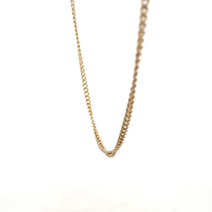 9ct yellow gold chain weighing 10.9g, unbranded, with a detailed close-up of the chain links and polished finish.