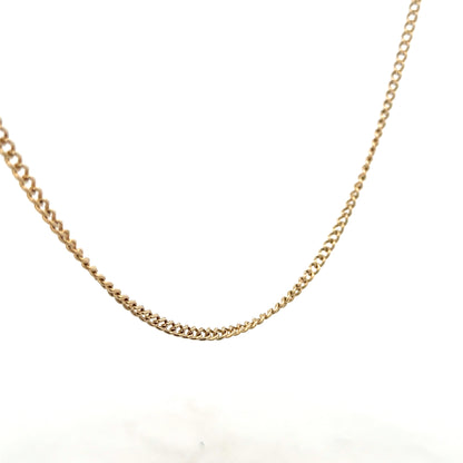 9ct yellow gold chain weighing 10.9g, showcasing a classic design with polished links. Unbranded jewelry piece.