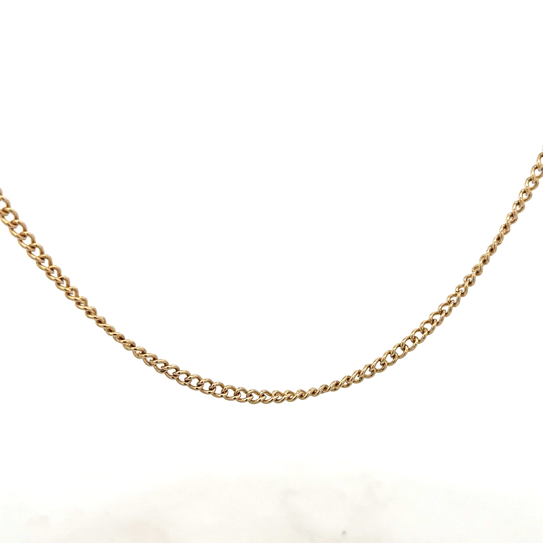 9ct yellow gold chain weighing 10.9g, featuring a classic link design, unbranded jewelry piece with a polished finish.