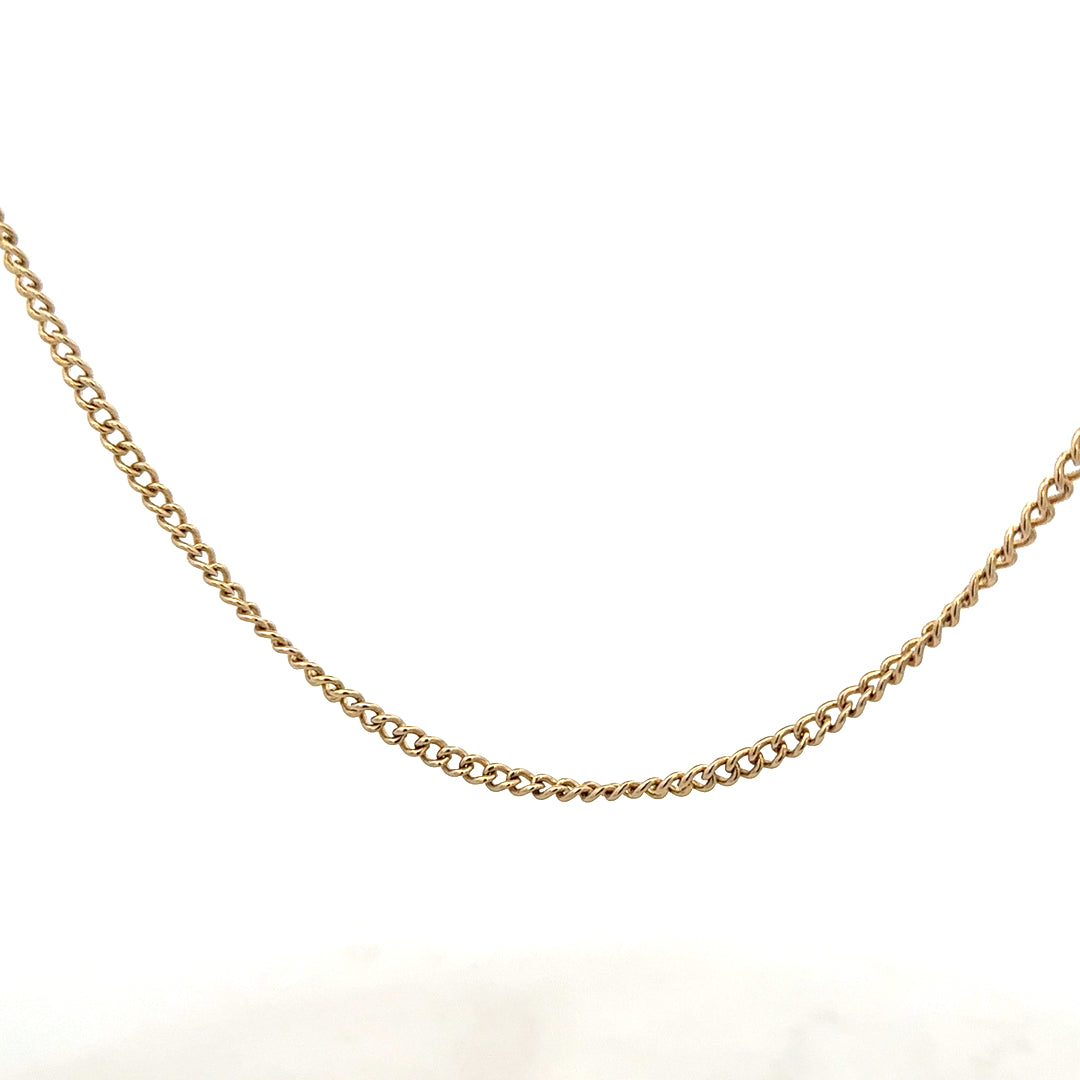 9ct yellow gold chain weighing 10.9g with a classic design, showcasing its elegant craftsmanship and shiny gold finish.