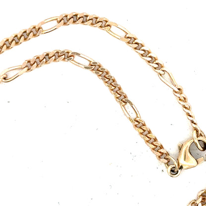 9ct yellow gold chain weighing 11.6g, unbranded, with a detailed close-up of the jewelry's polished finish and elegant design.