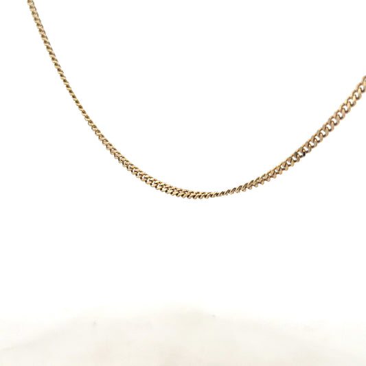 9ct yellow gold chain weighing 11g, unbranded, with a detailed close-up of the shiny, intricate link design.