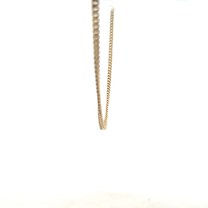 9ct yellow gold chain weighing 11g, unbranded, shown in a close-up image highlighting its fine craftsmanship and polished finish.