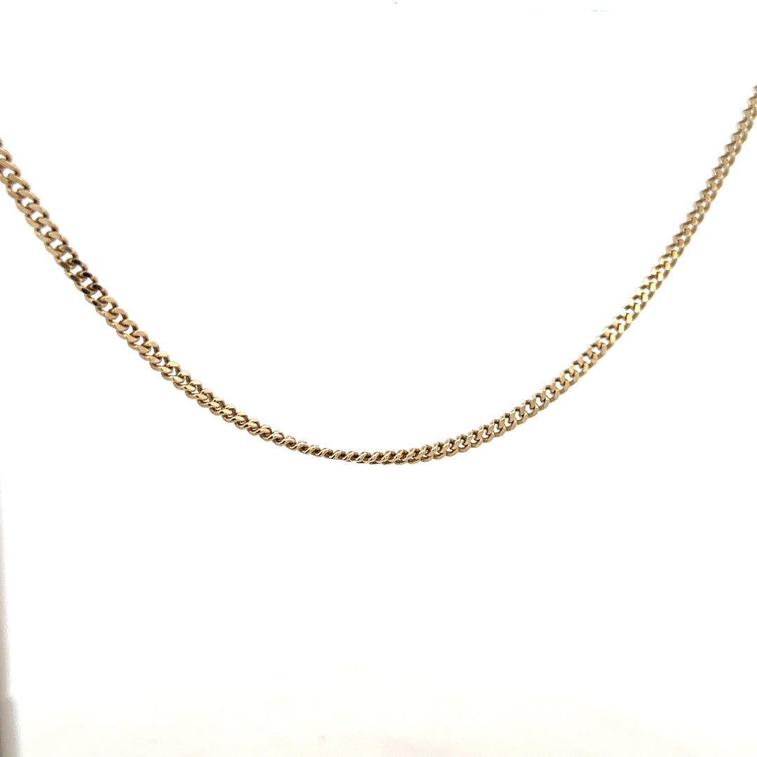 9ct yellow gold chain weighing 11g, unbranded, showing a close-up of the classic jewelry chain with detailed links.