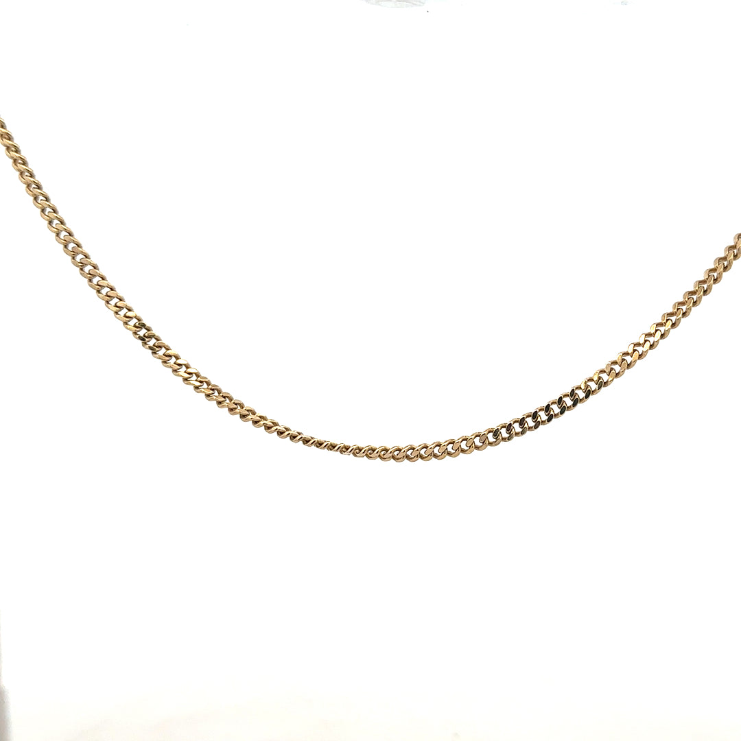 9ct yellow gold chain weighing 11g, unbranded, with a classic design and polished finish, displayed against a neutral background.