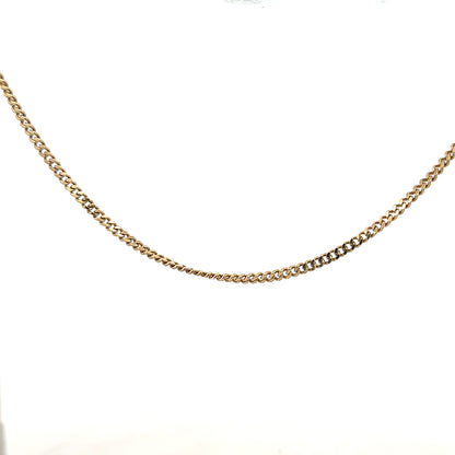 9ct yellow gold chain weighing 11g, unbranded, with a classic design and polished finish, displayed against a neutral background.