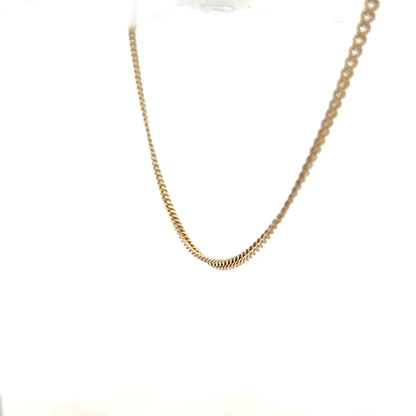 9ct yellow gold chain weighing 11g, featuring a classic link design, unbranded jewelry piece with a polished finish.