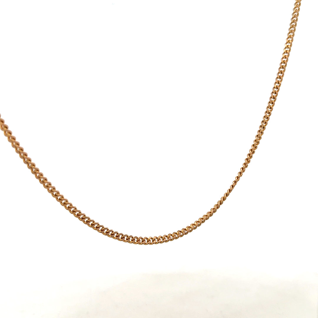 9ct yellow gold chain weighing 12.7g, unbranded, with a close-up view of its polished links and secure clasp.