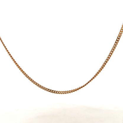 9ct yellow gold chain weighing 12.7g, unbranded, with a detailed close-up of the polished, linked jewelry piece.