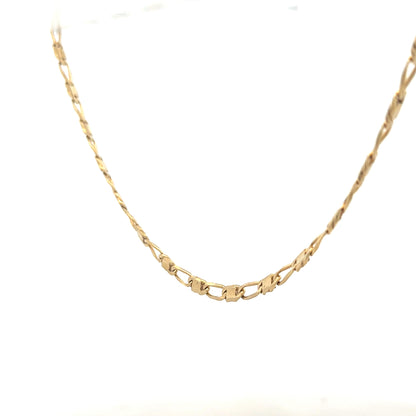 9ct yellow gold chain weighing 13.1g, showcasing a classic design with a smooth, polished finish.