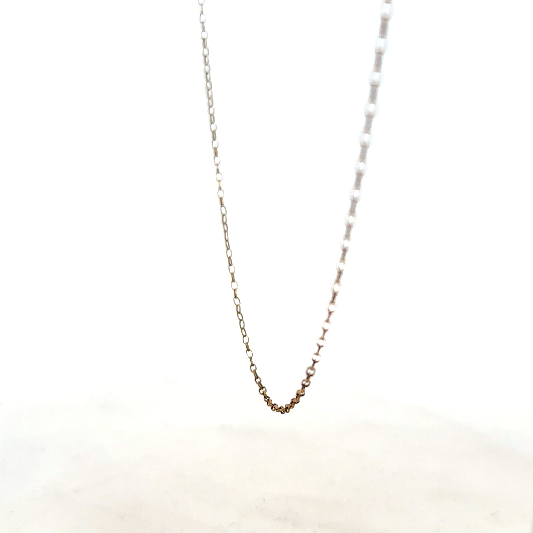 9ct yellow gold chain weighing 1g, unbranded, with a close-up view showing its fine link design.