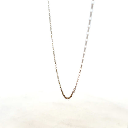 9ct yellow gold chain weighing 1g, unbranded, with a close-up view showing its fine link design.