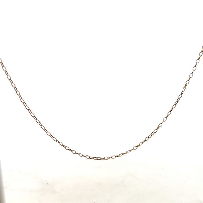 9ct yellow gold chain weighing 1g, unbranded, with a delicate link design, shown against a plain background.