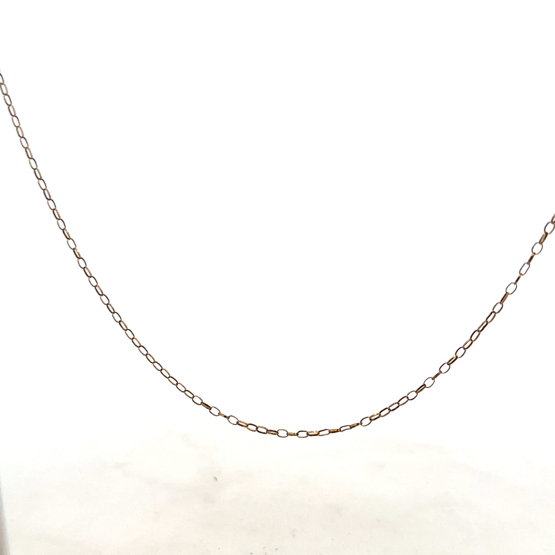 9ct yellow gold chain with a delicate design, weighing 1 gram, showcasing fine craftsmanship and bright gold finish.