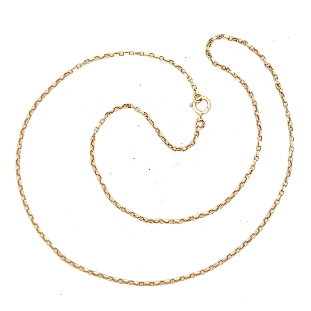 9ct yellow gold chain weighing 2.4g, unbranded, showcasing a delicate, shiny jewelry piece with a fine link design.
