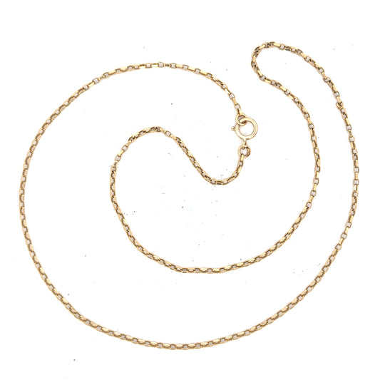 9ct yellow gold chain weighing 2.4g, unbranded, showcasing a delicate, shiny jewelry piece with a fine link design.