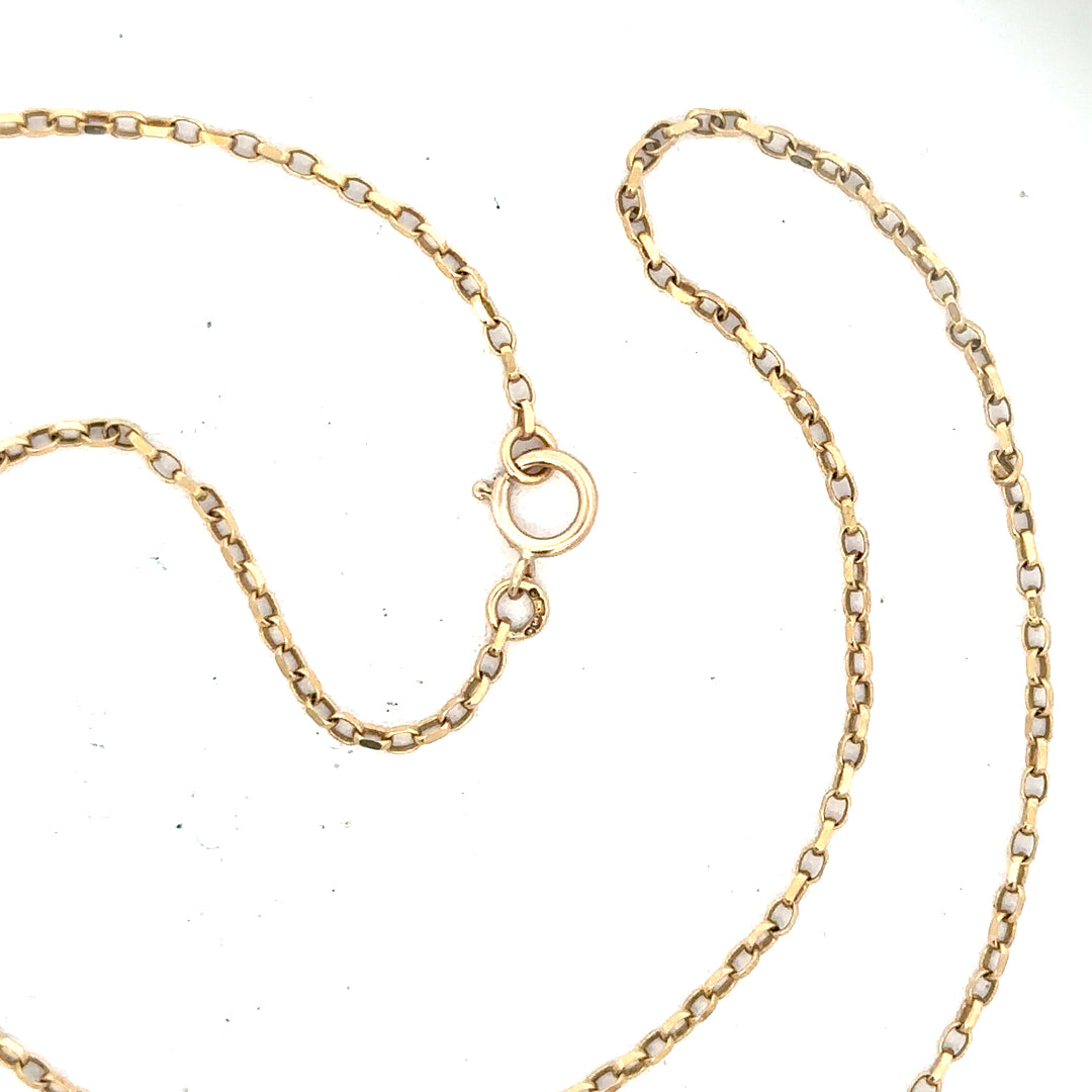 9ct yellow gold chain weighing 2.4g, unbranded jewelry accessory with a classic link design, shown in a close-up image.