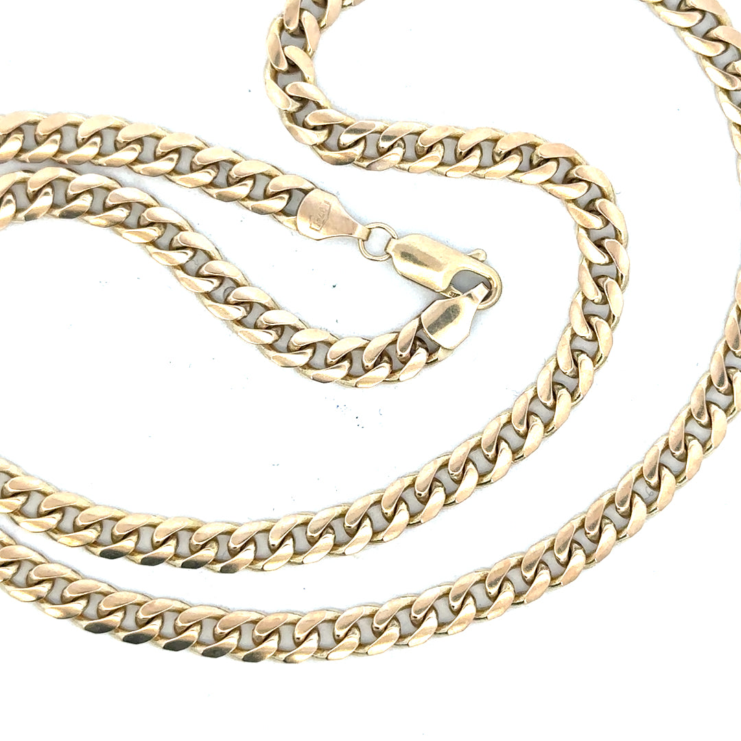 9ct yellow gold chain weighing 22.7g, crafted with a classic link design, displayed on a plain background.