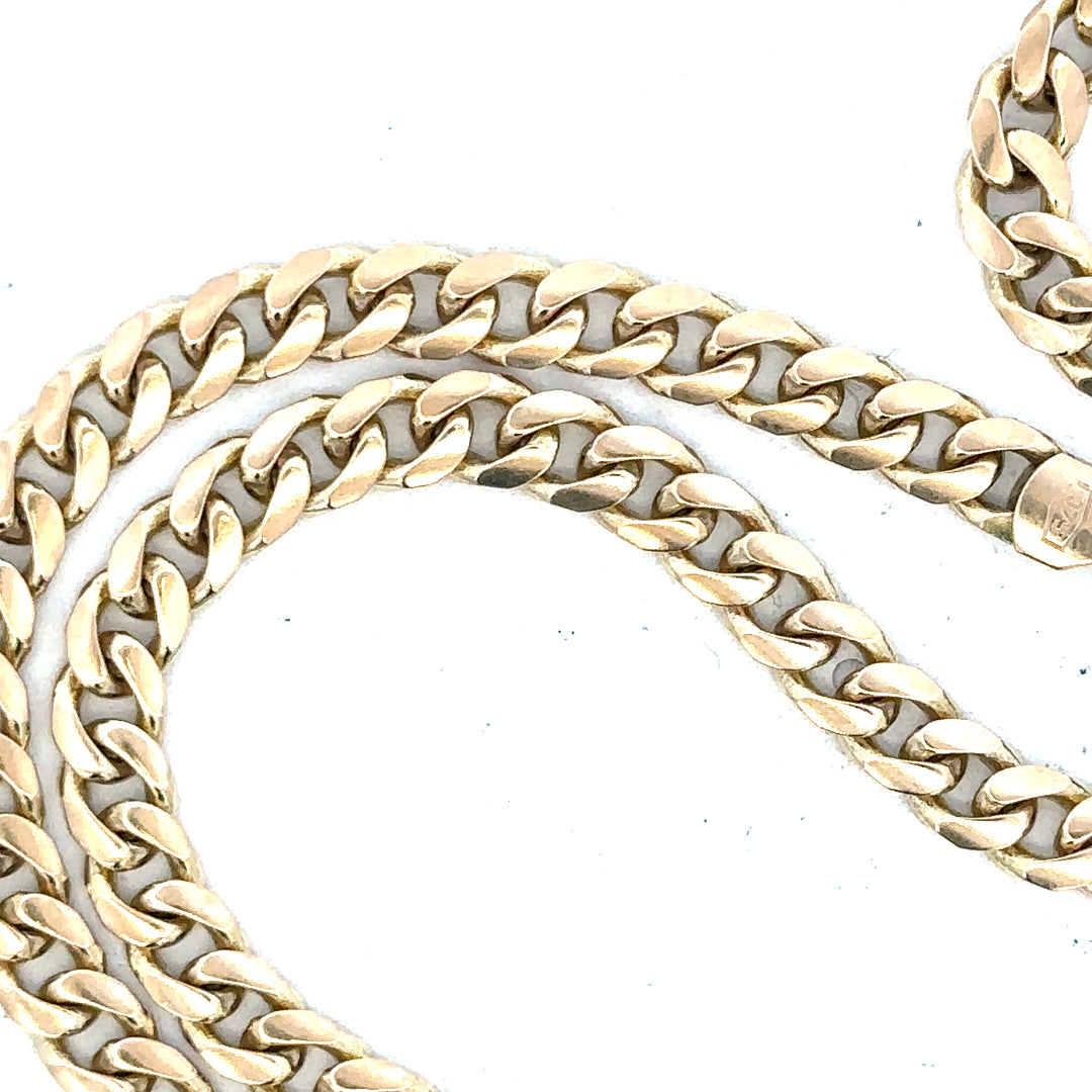 9ct yellow gold chain weighing 22.7g, unbranded, with a detailed close-up of the polished gold links.