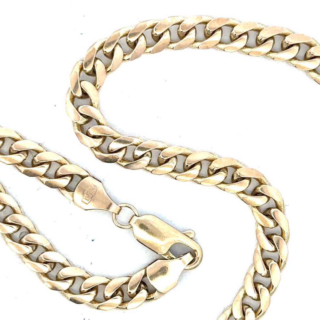 9ct yellow gold chain weighing 22.7g, unbranded, with a detailed close-up of its classic link design.