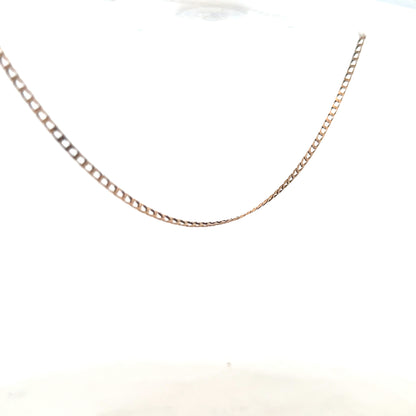 9ct yellow gold chain weighing 3.1g, unbranded, shown with close-up detail of the polished links and clasp.