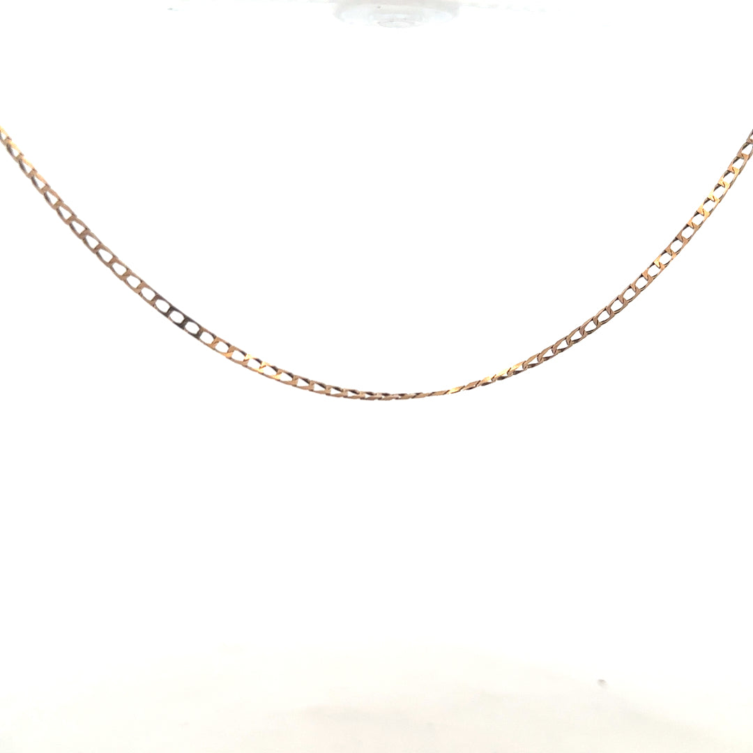 9ct yellow gold chain weighing 3.1g, displayed on a plain background, showcasing its fine chain link design and polished finish.