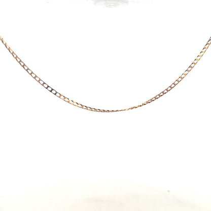 9ct yellow gold chain weighing 3.1g, displayed on a plain background, showcasing its fine chain link design and polished finish.