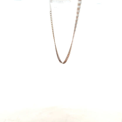 9ct yellow gold chain weighing 3.1g, unbranded jewelry with a classic design, shown in a close-up image.
