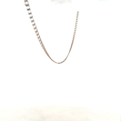 9ct yellow gold chain weighing 3.1g, unbranded, with a classic link design, shown in a close-up image.