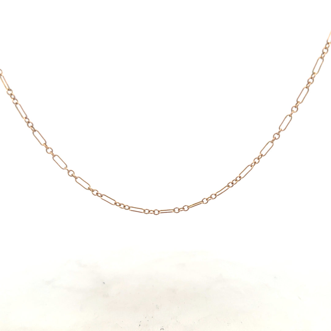 9ct yellow gold chain weighing 3.3g, unbranded jewelry with a classic design, shown in a clear close-up image.