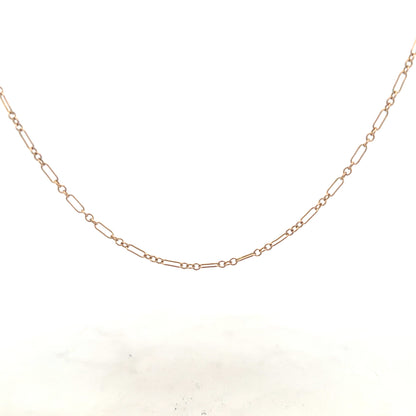 9ct yellow gold chain weighing 3.3g, unbranded jewelry with a classic design, shown in a clear close-up image.