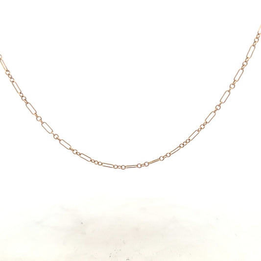 9ct yellow gold chain weighing 3.3g, unbranded jewelry with a classic design, shown in a clear close-up image.