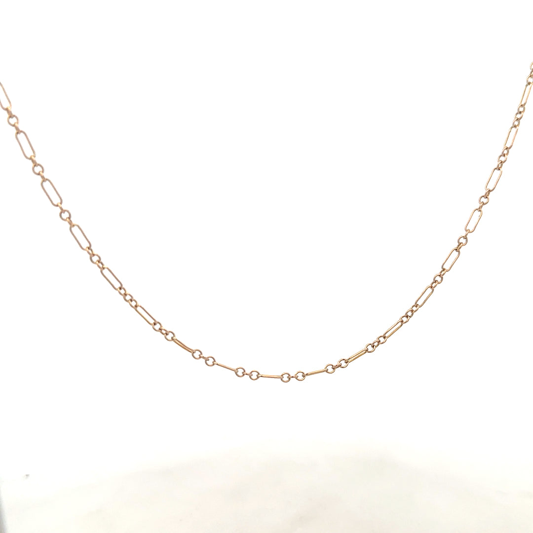 9ct yellow gold chain weighing 3.3g, unbranded, with a classic link design, shown in a close-up image.