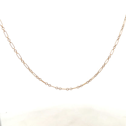 9ct yellow gold chain weighing 3.3g, unbranded, with a classic link design, shown in a close-up image.
