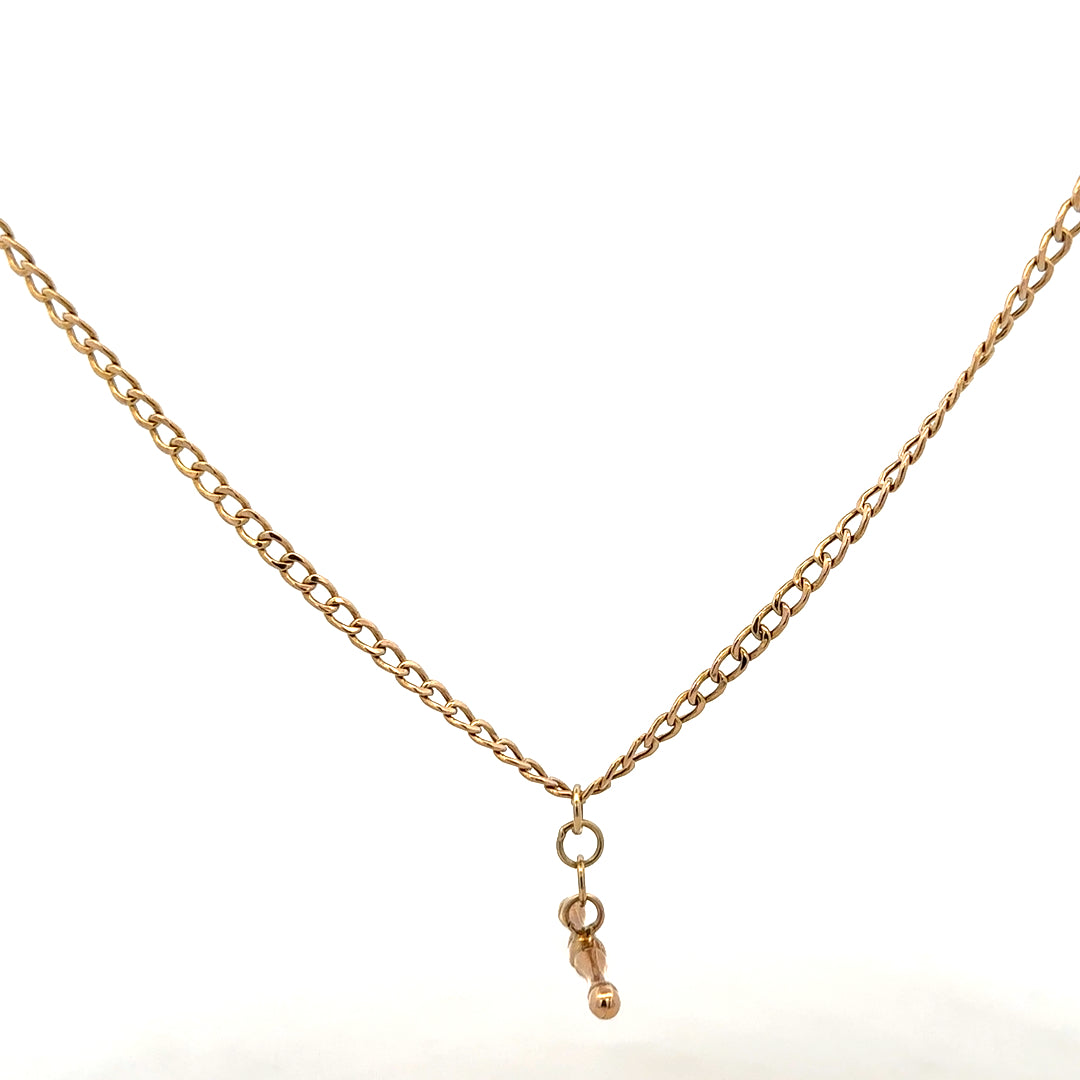 9ct yellow gold chain weighing 3.7g, displayed with detailed links, showcasing a classic jewelry design.