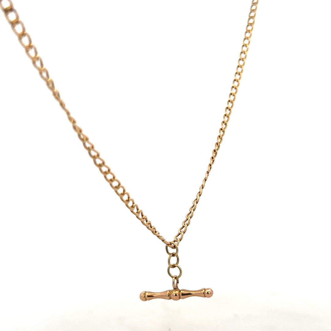 9ct yellow gold chain weighing 3.7g, featuring a classic link design, unbranded jewelry accessory, photographed on a plain background.