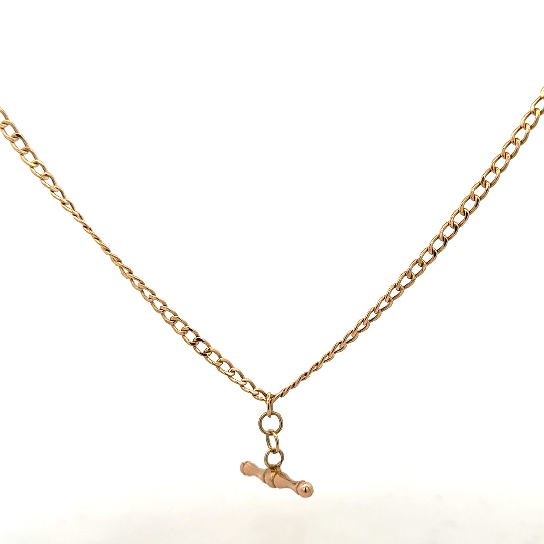 9ct yellow gold chain weighing 3.7g, featuring a classic link design, unbranded jewelry item with detailed craftsmanship.
